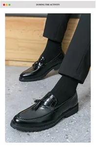 Detail view of men's vintage black tassel loafers with crocodile pattern texture