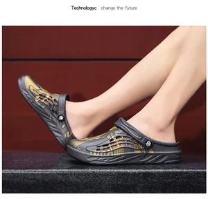 Close-up of men's breathable clogs with stylish gold pattern on feet for summer outdoor wear.