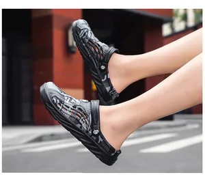 Close-up of men's patterned outdoor clogs with a breathable hollow design for summer beach wear.