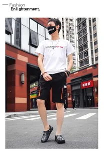 Fashionable men's outdoor breathable beach clogs worn by a model in an urban street setting