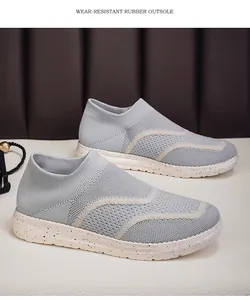 Breathable light gray knit slip-on sneakers with speckled wear-resistant rubber sole.