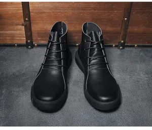 High-quality black textured leather Martin boots featuring durable round laces