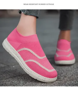 Close-up of pink knit walking shoe with wear-resistant rubber outsole