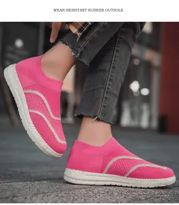 Detailed view of pink mesh slip-on sneakers with durable wear-resistant rubber outsole.