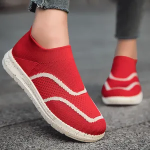 Men's red knit slip-on sneakers with stylish wave patterns for outdoor sports