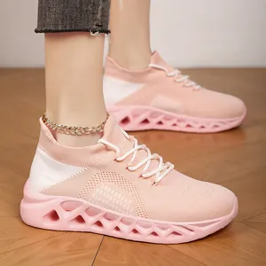 Breathable pink fly-knit sneakers with hollow sole for women, casual running shoes