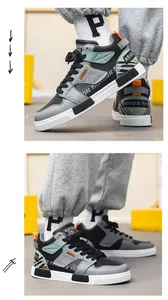 Vista dettagliata delle sneakers alte da uomo in grigio e nero per uso sportivo