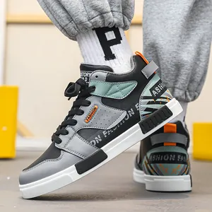 Eleganti sneakers alte da uomo in nero e grigio dal design sportivo per tutti i giorni