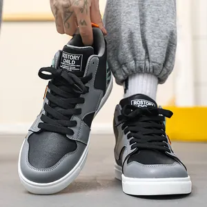 Eleganti sneaker alte da uomo in grigio e nero ideali per lo streetwear quotidiano moda