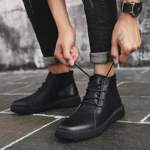 Stylish black leather high-top Martin boots for men featuring a classic lace-up design