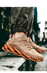 Detailed close-up of men's breathable blade running shoes in brown with knit upper