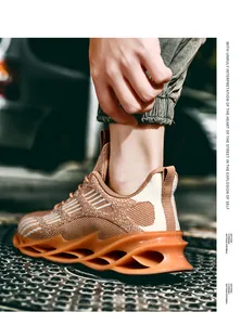 Close-up detail of breathable fly-knit men's blade running sneakers in brown