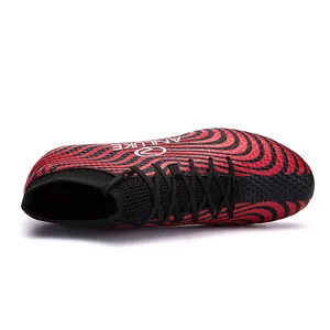 Botas de fútbol de caña alta rojas y negras para hombre con tacos AG profesionales