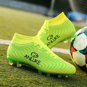 Botas de fútbol de caña alta verde neón con patrones ondulados y tacos AG