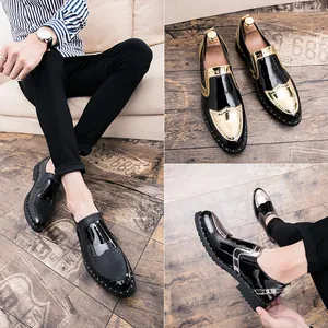 Close-up of British style men's brogue shoes with patent leather and rivet details