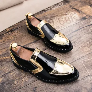 Detail showing black patent leather brogue shoes with gold accents and silver studs.