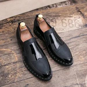 High-quality detail of men's black Brogue dress shoes with stylish stud detailing
