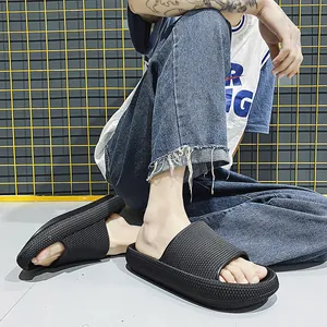 Trendy men's thick-soled black slide sandals for indoor and outdoor summer wear usage