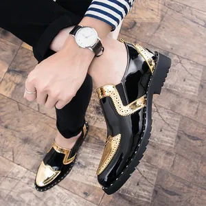 Mens black and gold brogue shoes with rivet detailing in stylish British style