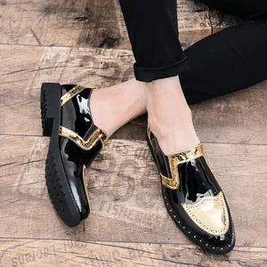 Detailed view of black patent leather Brogue shoes with gold trim and rivet sole