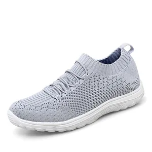 Women's breathable knit slip-on running shoes in light purple with white flat sole