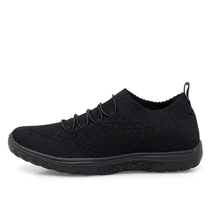 Lightweight black fly-woven mesh women's slip-on sneakers for running and casual wear.