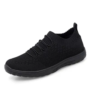 Breathable black fly-knit mesh slip-on sneakers for women daily casual walking shoes