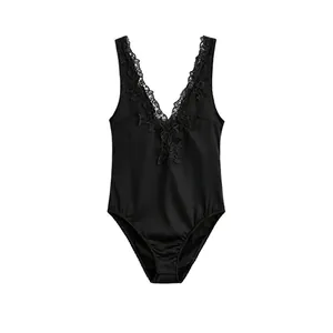 Detailed view of elegant black satin bodysuit with delicate lace V-neckline trim