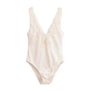 Elegant white silk satin bodysuit featuring delicate floral lace embroidery at the V-neckline
