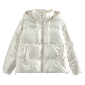 Detailed front view of a shiny pearl white metallic hooded puffer jacket for women
