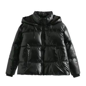 High quality close-up of a glossy black metallic hooded puffer jacket for women.