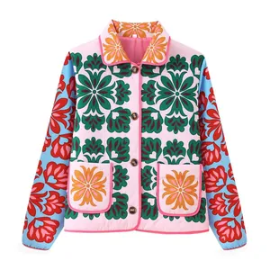 Close-up of a vibrant street style floral printed padded jacket with wooden buttons