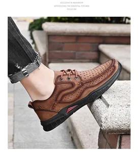 Detailed view of brown perforated men's leather outdoor casual shoe with thick sole