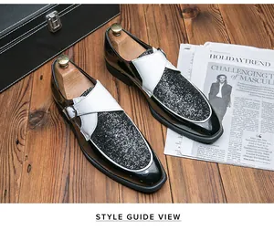 Stylish glossy black and white monk strap shoes with glitter texture detail