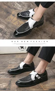 Close-up of stylish black and white glitter dress shoes for men with buckle strap