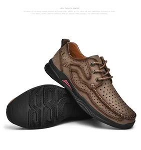 Close-up showing the breathable hollow design and textured sole of men's outdoor leather shoes