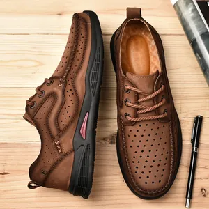 Brown breathable men's outdoor leather shoes with thick sole and perforated design