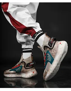 Detail view of men's high-top basketball sneakers with trendy marble patterned sole