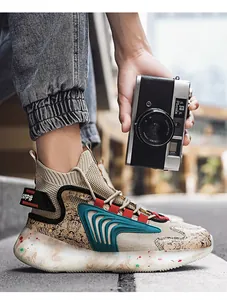 Detailed side view of khaki high-top chunky sneaker with marbled sole and blue accents