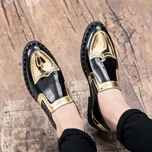 Men's stylish black patent leather Brogue shoes with gold metallic accents and studs
