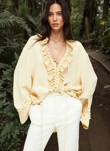 Elegant yellow V-neck chiffon summer top featuring intricate pleated ruffle details