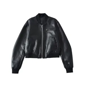 Detailed view of women's black faux leather bomber jacket with silver zipper and ribbed trim