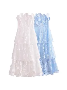 Elegant strapless tiered maxi dress with 3D floral embroidery in white and blue.