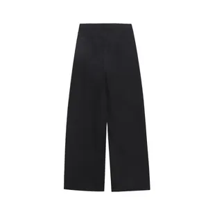 Detailed back view of women's vintage black wide-leg denim pants featuring rear pockets