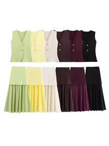 Elegant women's knit vest and pleated skirt set in six colors with gold button details.