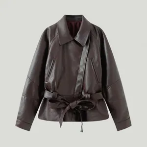 Detail view of burgundy faux leather short trench coat with waist belt for women