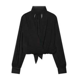 Elegant black wrap-front long sleeve blouse with stand collar and tie-hem detail