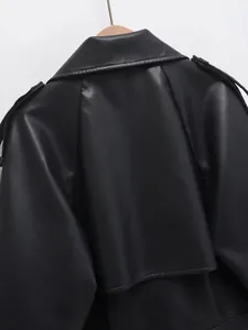 Detailed macro view showing the back yoke and faux leather texture of a biker jacket