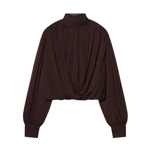Elegant chocolate brown high-neck draped long-sleeve blouse with twisted front detail
