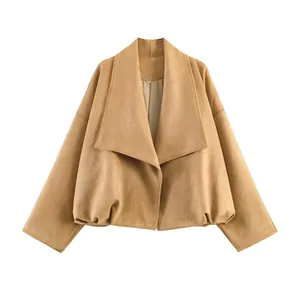 Detailed view of women's khaki suede loose jacket featuring a large lapel and oversized fit